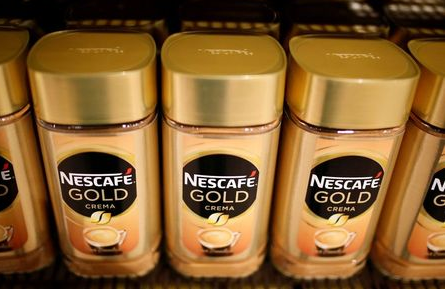 FILE PHOTO: Jars of Nescafe Gold coffee by Nestle are pictured in the supermarket of Nestle headquarters in Vevey, Switzerland, February 13, 2020. REUTERS/Pierre Albouy/File Photo GLOBAL BUSINESS WEEK AHEAD