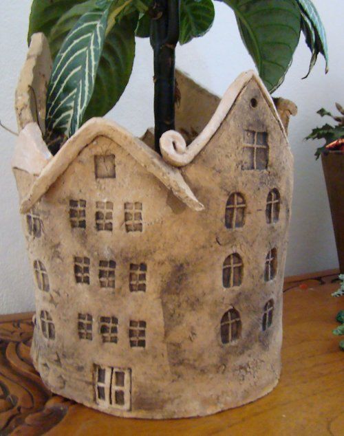 lovely, and also practical, ceramic work - could make similar using a coiled pot as opposed to needing a form or mould :) . . .