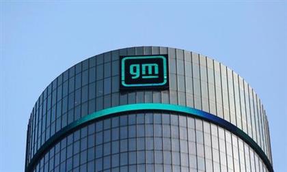 The new GM logo is seen on the facade of the General Motors headquarters in Detroit, Michigan, U.S., March 16, 2021. Picture taken March 16, 2021. REUTERS/Rebecca Cook