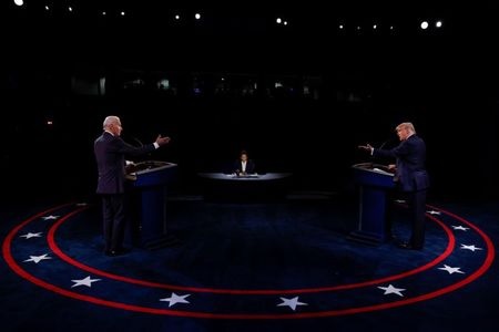 Democratic presidential nominee Joe Biden and U.S. President Donald Trump participate in their second 2020 presidential campaign debate at Belmont University in Nashville, Tennessee, U.S., October 22, 2020. REUTERS/Jim Bourg
