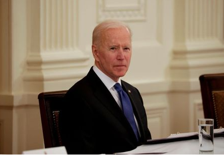 FILE PHOTO: U.S. President Joe Biden holds first Cabinet meeting at the White House in Washington, U.S., April 1, 2021. REUTERS/Tom Brenner/File Photo