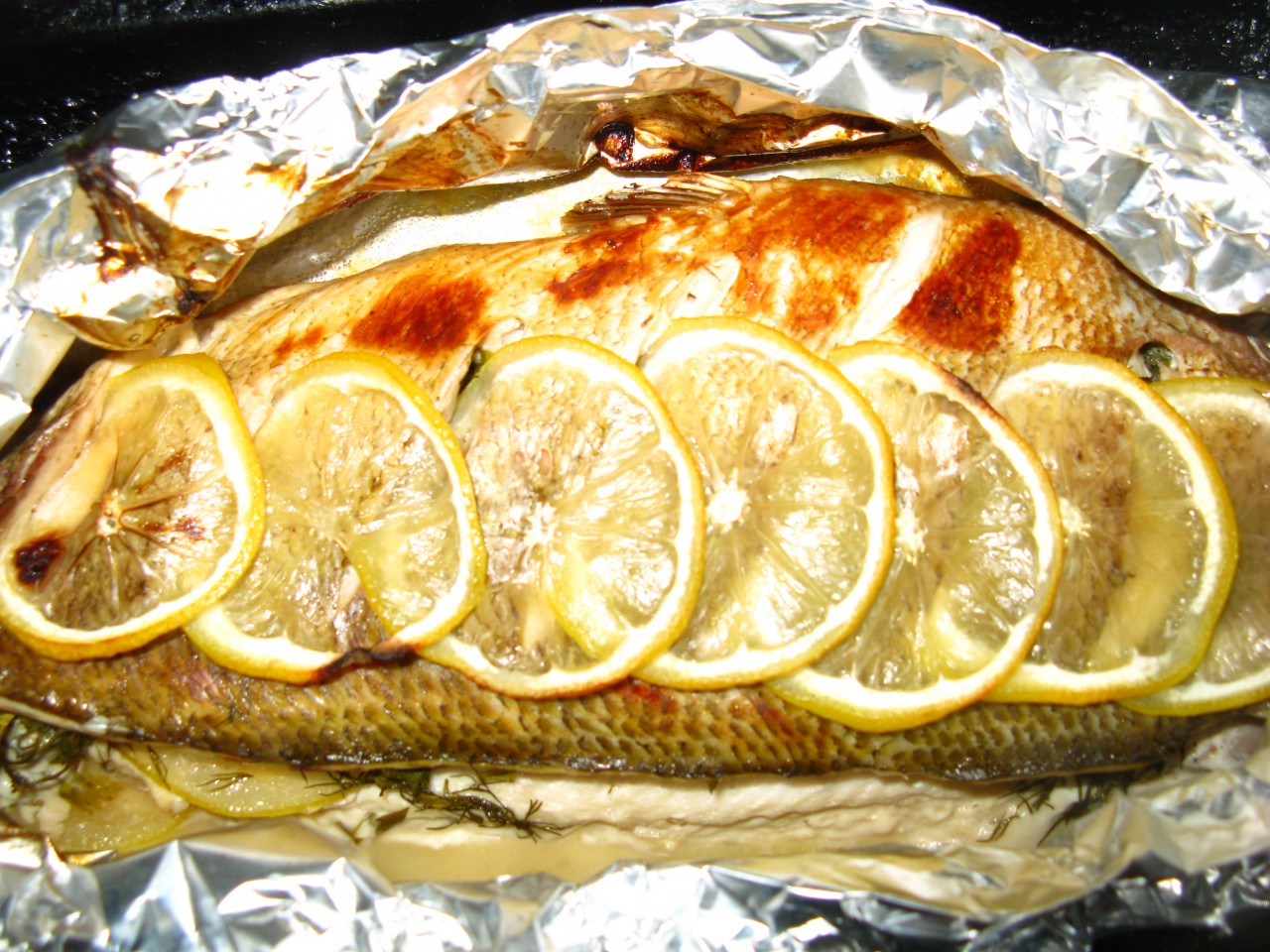 Рыба запеченная с лимоном в духовке