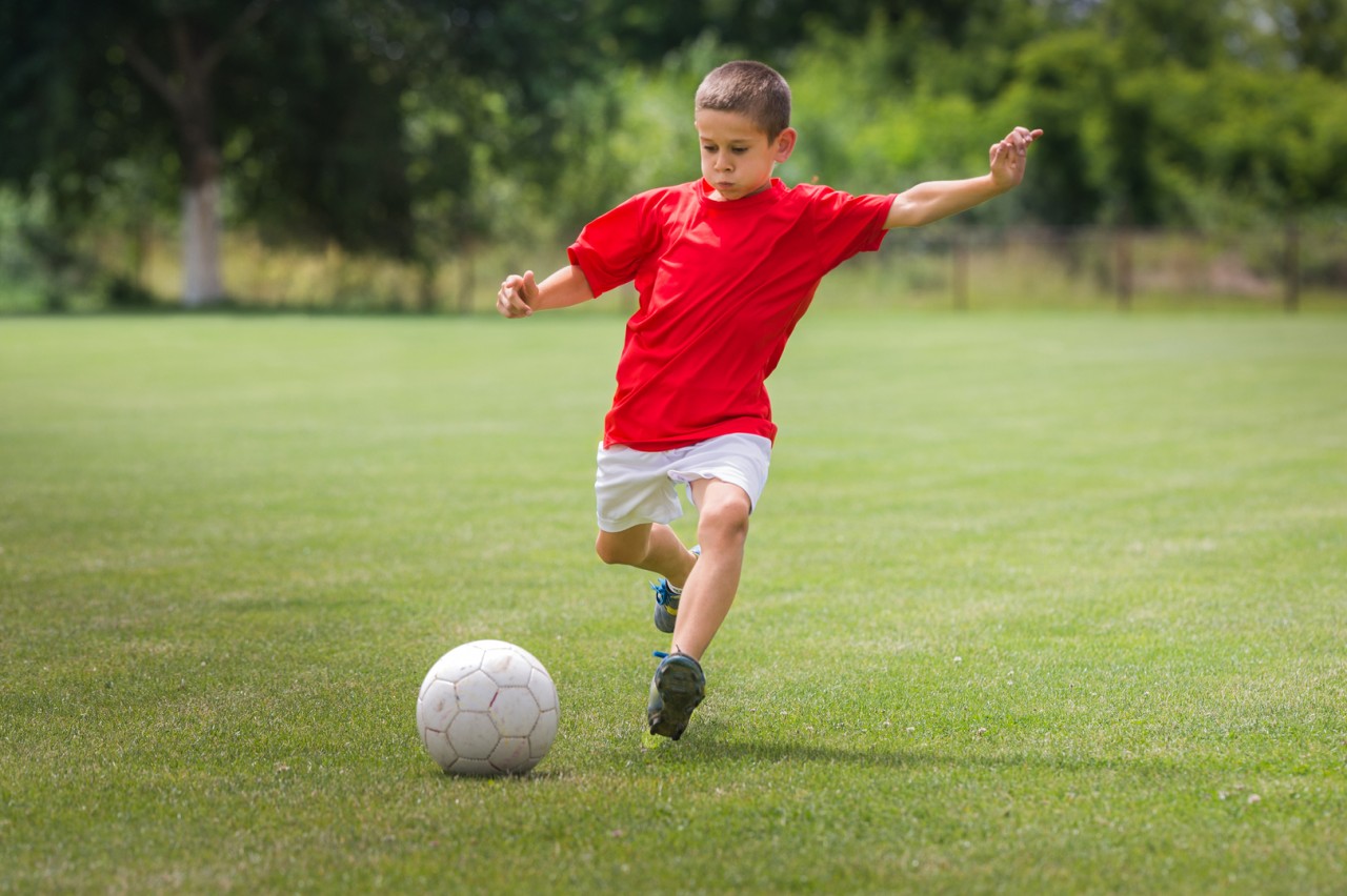 He is playing Football