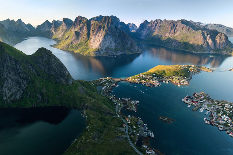 Scenic landscape of Lofoten islands: peaks, lakes, and houses. Reine village, rorbu, reinbringen