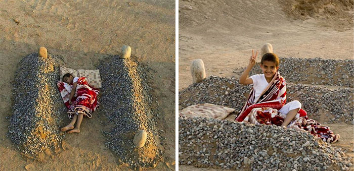  A Kid Sleeping Near His Deceased Parents' Graves In Syria