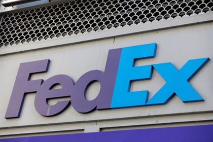 Signage is seen on a FedEx location in Manhattan, New York City, U.S., September 3, 2021. REUTERS/Andrew Kelly 