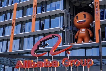 The Alibaba Group logo is seen during the company's 11.11 Singles' Day global shopping festival at their headquarters in Hangzhou, Zhejiang province, China, November 11, 2020. REUTERS/Aly Song