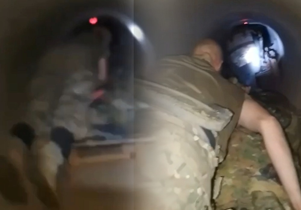 По трубе передвигались лёжа на специальных тележках. Скрин видео тг-канал "Военкор Котенок".